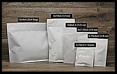 Example exit packaging shows six mylar bags. Each bag is plain white and labeled with the dimensions of the bag. The sizes are 12 by 9 by 4 (Exit Bag), 6 by 10 b 2.5 (1 ounce), 5 by 8 by 2.5 (1/2 ounce), 4 by 7.25 by 2 (1/4 ounce), 3.75 by 6 by 2 (1/8 ounce), and 3.75 by 4 (1 gram).